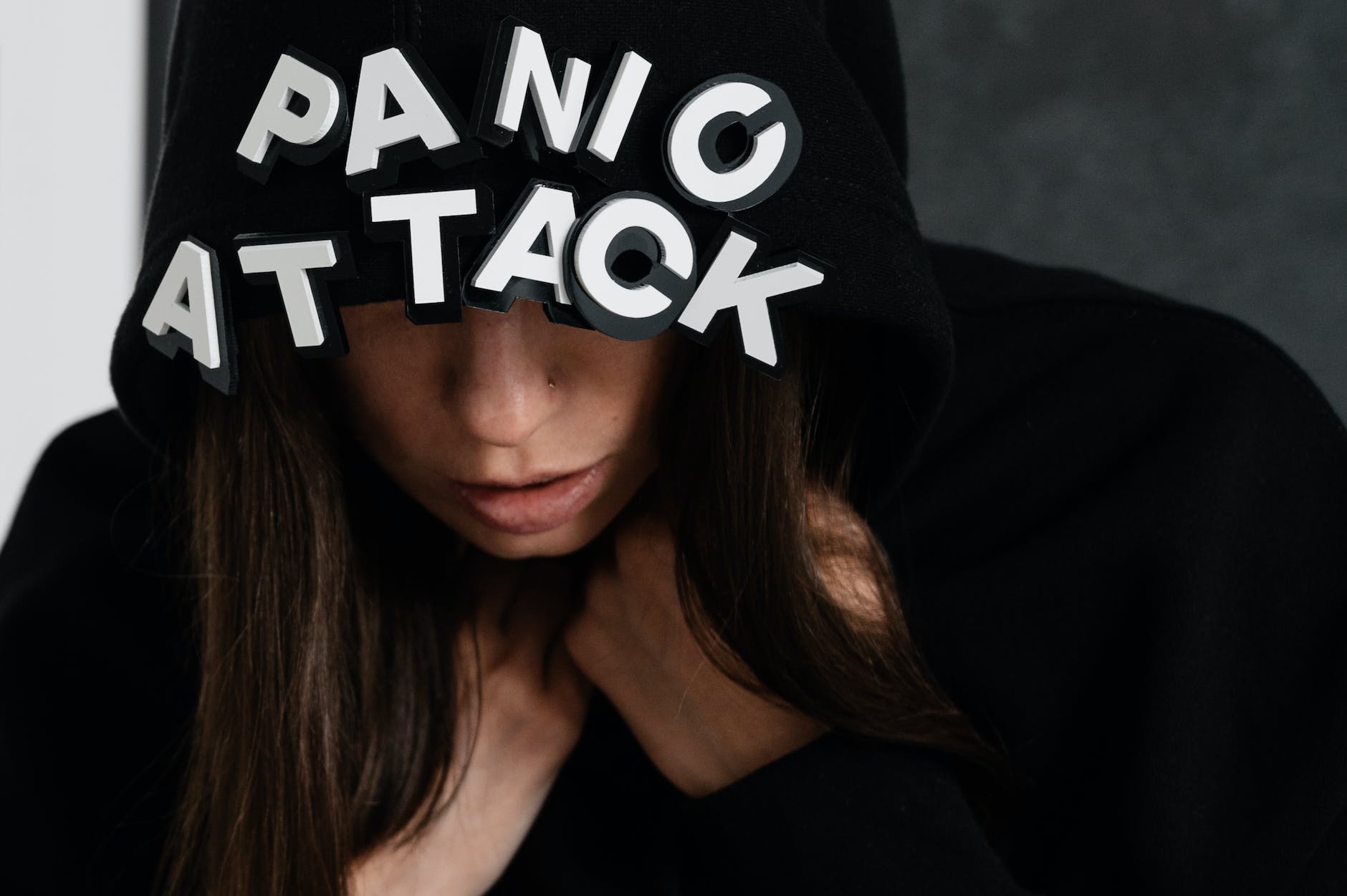 woman wearing a black hoodie